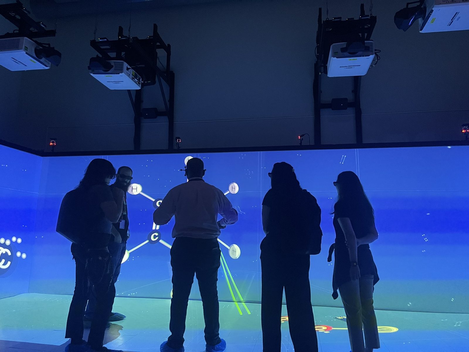 Ceiling projectors above the CAVE walls