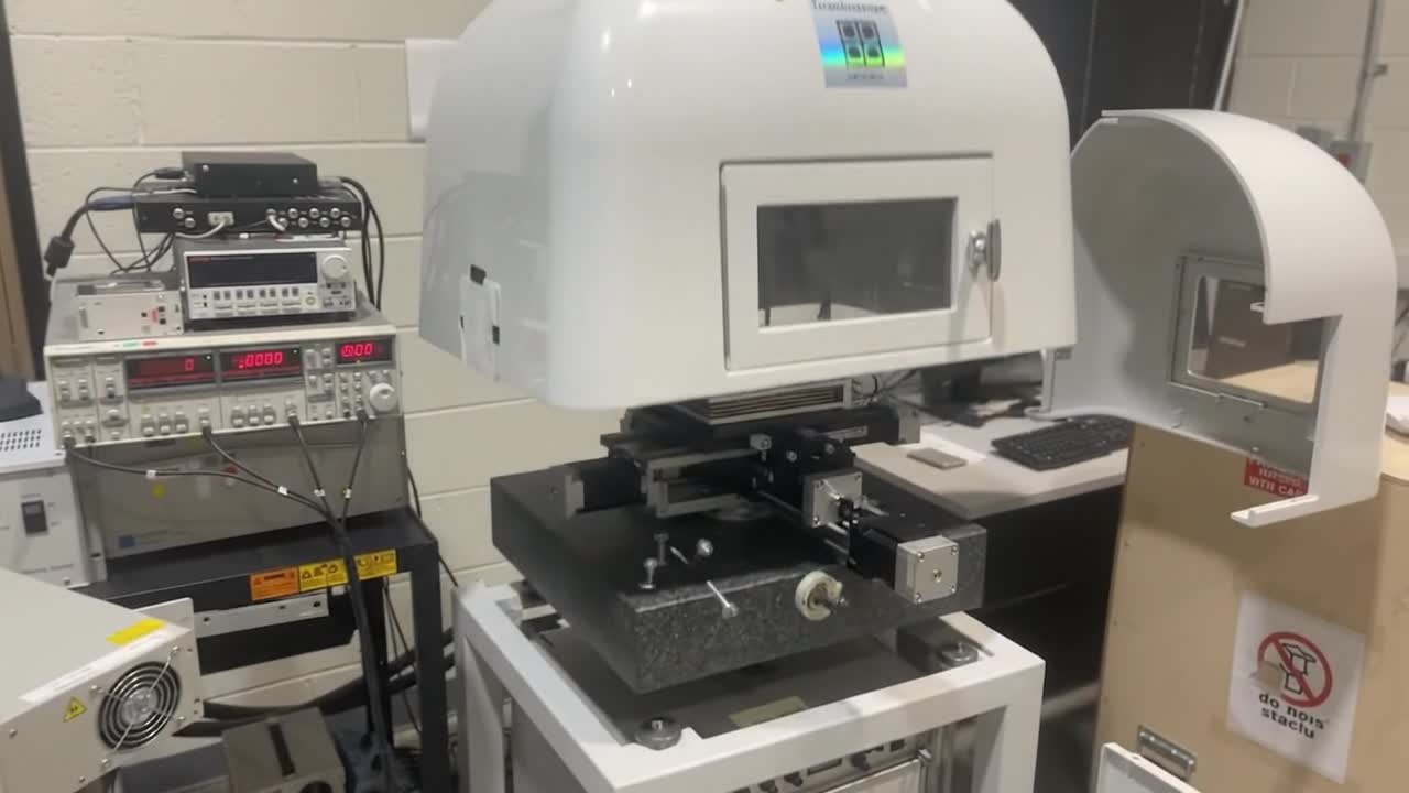 The Hysitron TriboIndenter (TI 900 series) opened up to show its main parts (AI-generated animation)